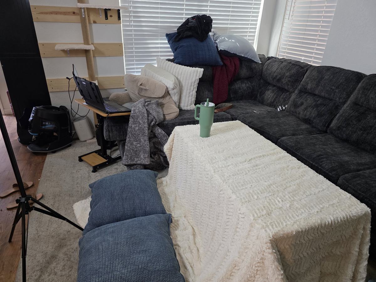 Behind the scenes: the photo setup with mismatched pillows shoved out of frame